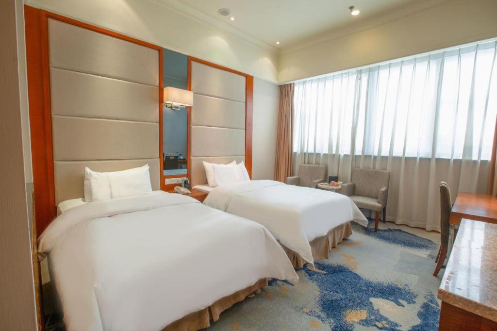 Linyi Blue Horizon Intenational Hotel Exteriör bild